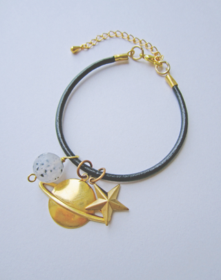 Illustration for article titled Celebrate Your Love of Space With This Solar System Necklace